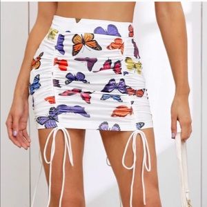 Butterfly print runched body con skirt